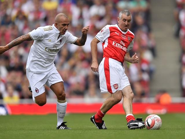 Still got it - Nigel Winterburn shakes off Paolo di Canio in a recent Arsenal Legends match